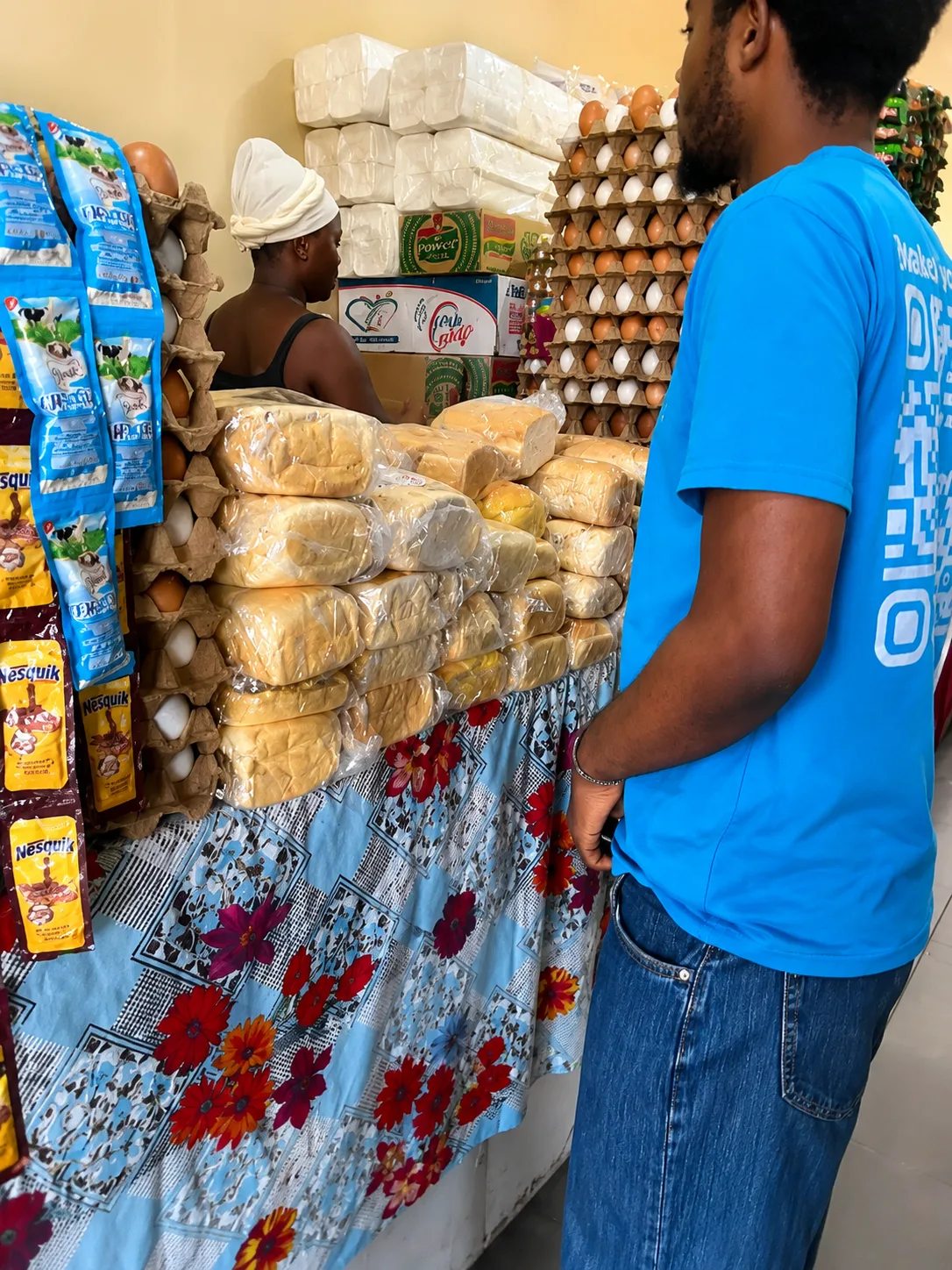 Mcket errander shopping for a customer at a local market